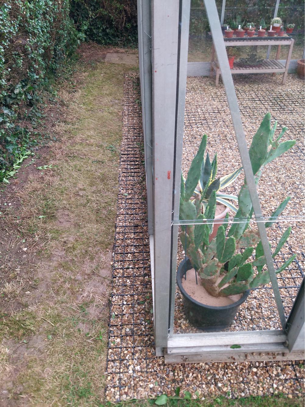 Rejillas de base para invernadero de plástico con relleno de grava
